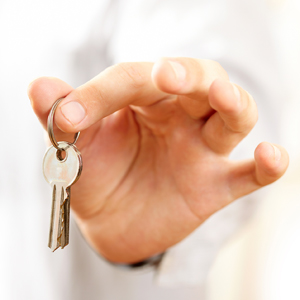 Photo of hand holding a key
