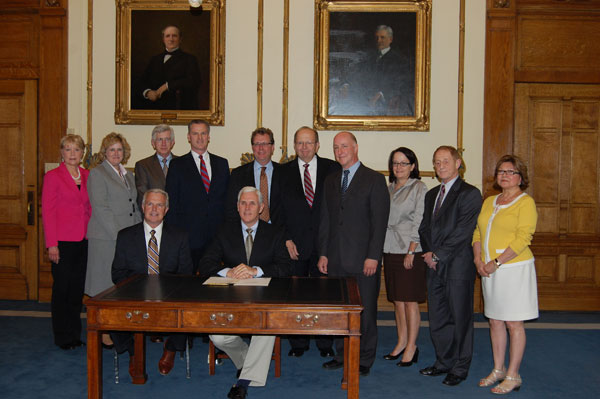 Photo of Governor and others attending bill signing