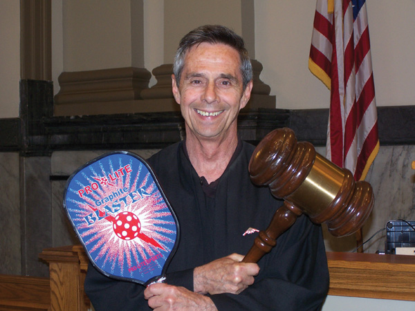 Judge Adler with Pickleball racquet and Gavel
