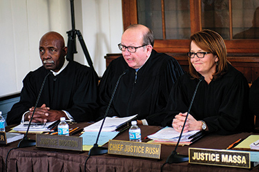 Justices Rucker, Dickson, and Rush engage in Oral Arguments in Corydon.