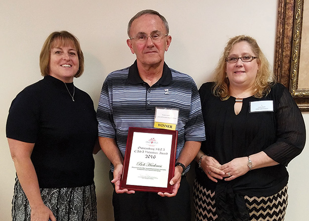 Bob Harnkess, a Kosciusko County CASA volunteer, poses with State GAL/CASA Director Leslie Dunn and Kosciusko County CASA Executive Director Mackenzie Cloutier.