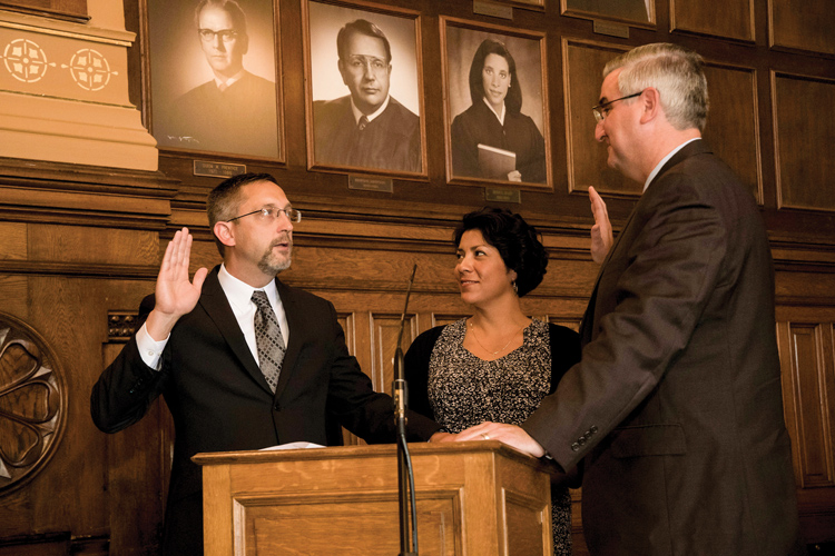 Justice Goff is sworn in by Governor Holcomb