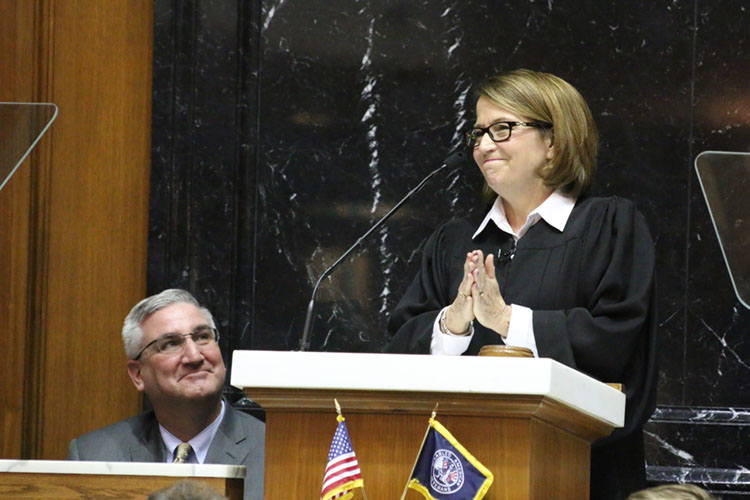 Chief Justice Loretta Rush and Governor Eric Holcomb