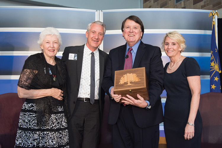 Former Chief Justice Randall T. Shepard with others after receiving the Heritage Keeper Award from the Indiana State Museum.