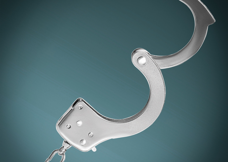 Open handcuff against blue gradient background