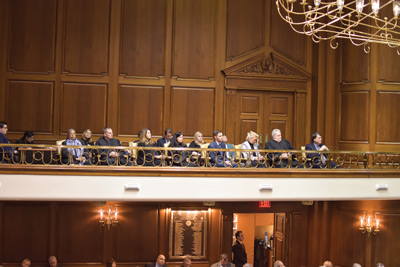 Guests sit in the ornate north balcony of the Indiana House of Representatives.