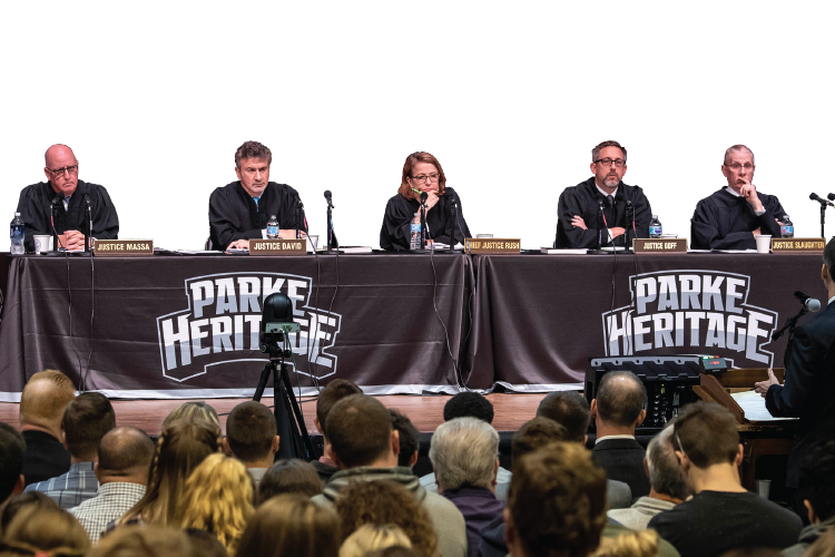 From left, Justice Mark Massa, Justice Steven David, Chief Justice Loretta Rush, Justice Christopher Goff, and Justice Geoffrey Slaughter sit on the bench at Parke Heritage High School. Photo by Chris Bucher