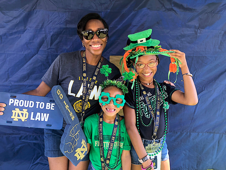 Judge Cristal Brisco and her two daughters Alexa and Brianna dress up in Notre Dame attire.