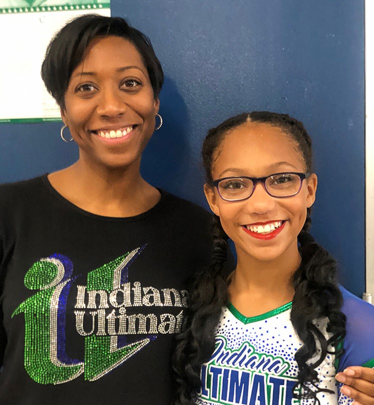 Magistrate Brisco and her daughter Brianna wear Indiana Ultimate cheerleading attire.