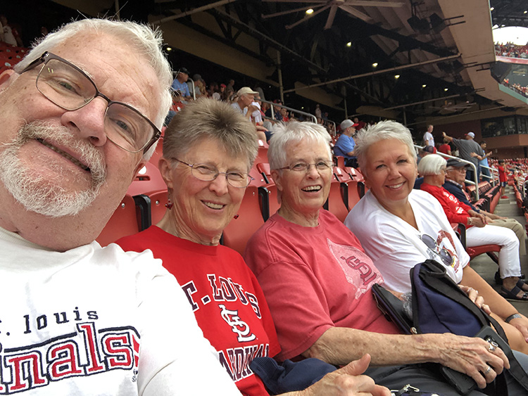 Judge Kimberly Dowling's husband Ralph takes a group selfie while seated at a baseball game.
