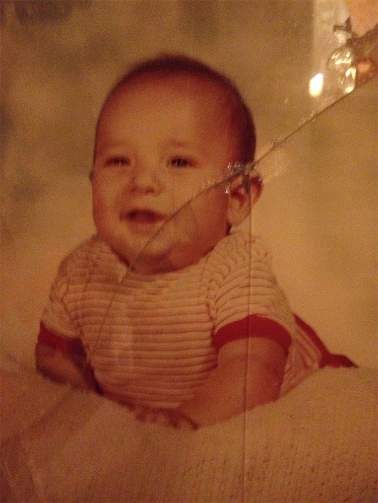 A sepia-tone photograph of Judge Salinas as an infant.