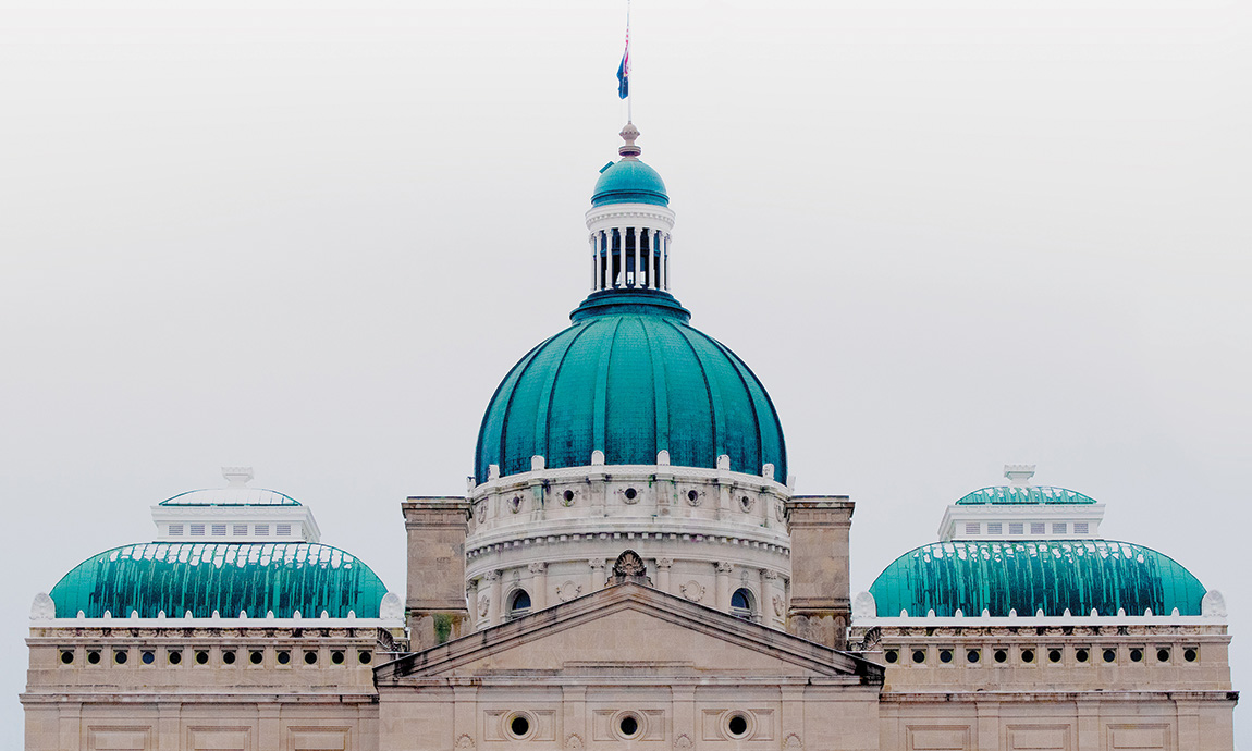 Indiana's state house with oxidized roofing shown with exaggerated color saturation.