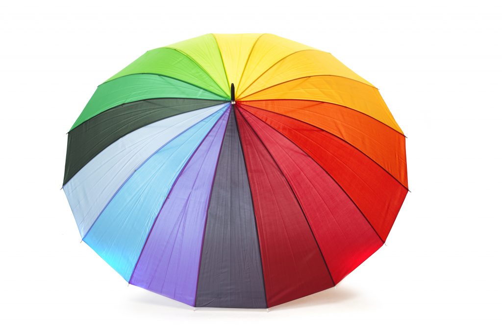 A rainbow-colored umbrella, isolated