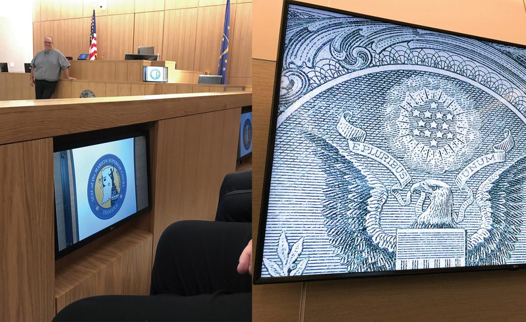 Exhibit display systems inside a courtroom.