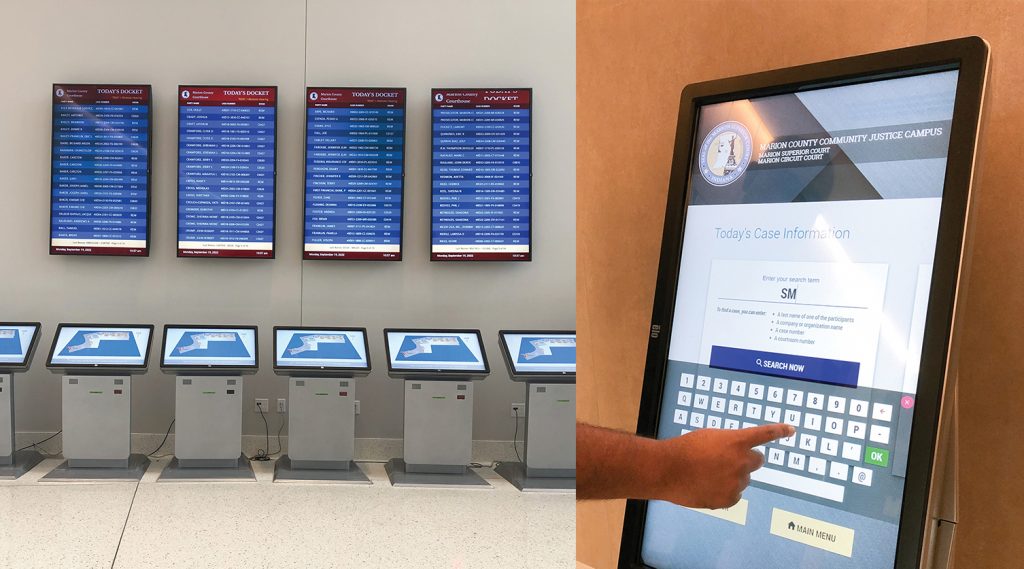 Wayfinding and information kiosks inside the courthouse lobby displaying the daily scheduled hearings.