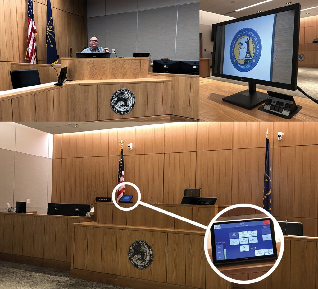 Remote controls inside a courtroom displaying what is being shown on the display monitors.