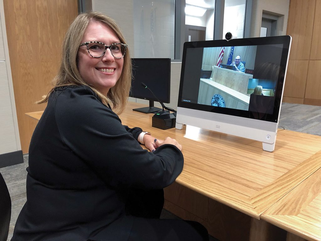 Judge Amy Jones and Judge Marc Rothenberg in the middle of a video conference.