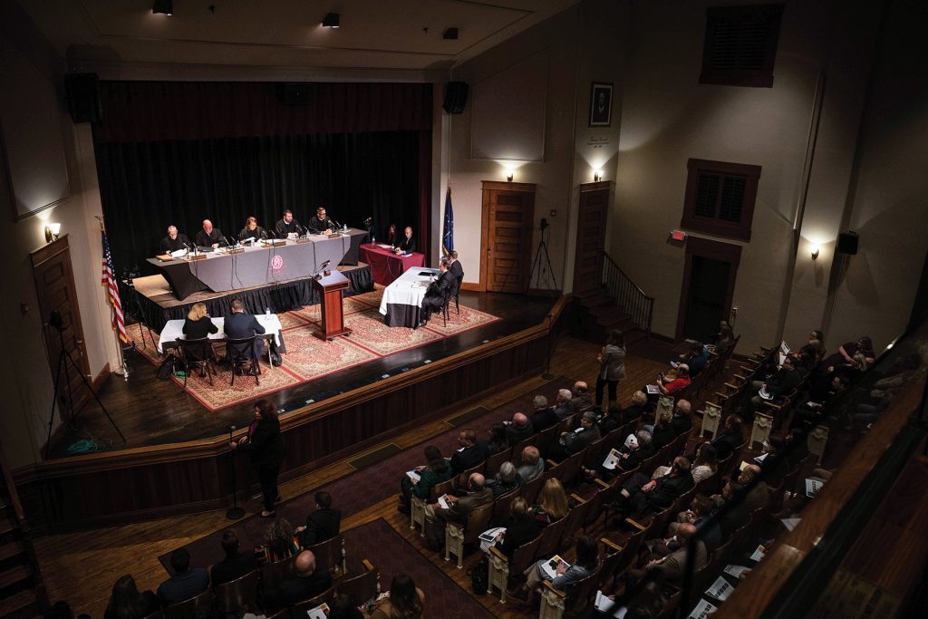 The Indiana Supreme Court holding oral arguments with a local audience in the Mitchell Opera House in Lawrence County.