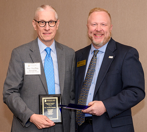 Photo of Justice Geoffrey Slaughter standing with Indiana Bar Foundation President & CEO Charles Dunlap.