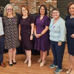 Photo of local judicial officers and stakeholders and Chief Justice Loretta Rush at the Problem-Solving Court Month celebration in Jeffersonville.