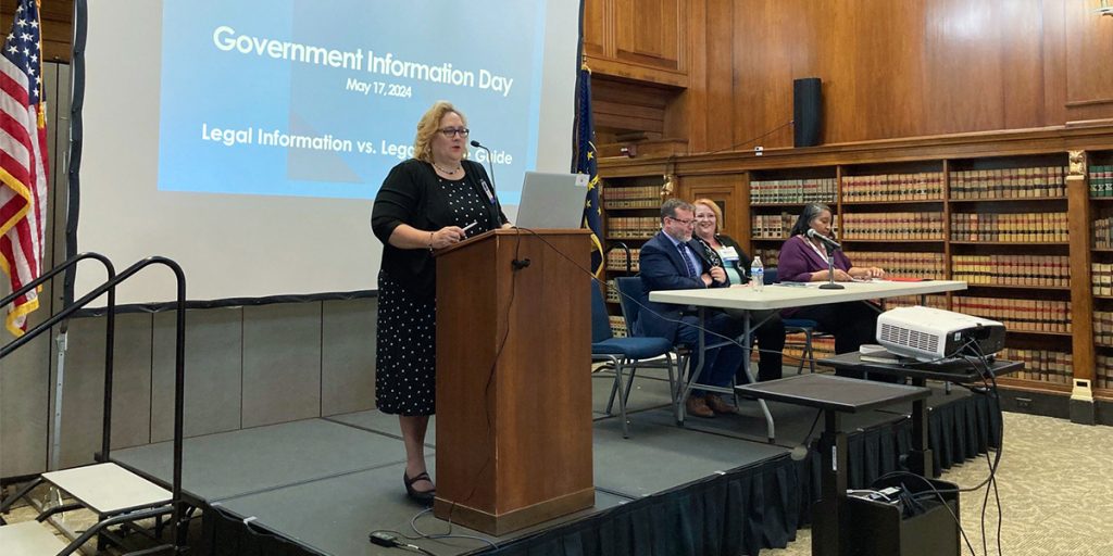 Photo of Leslie Dunn speaking during Government Information Day.