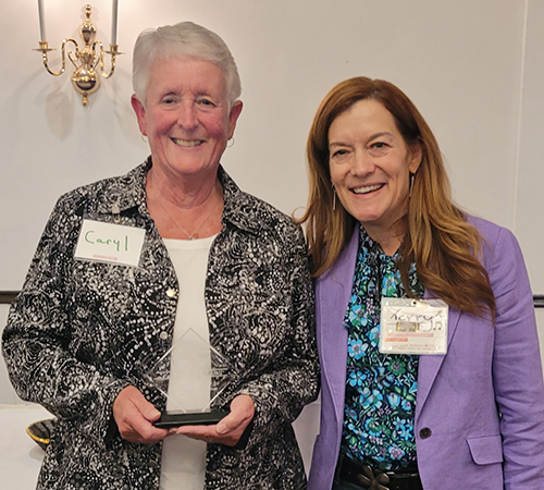 Photo of Judge Caryl Dill standing with JLAP Executive Director Terry Harrell.