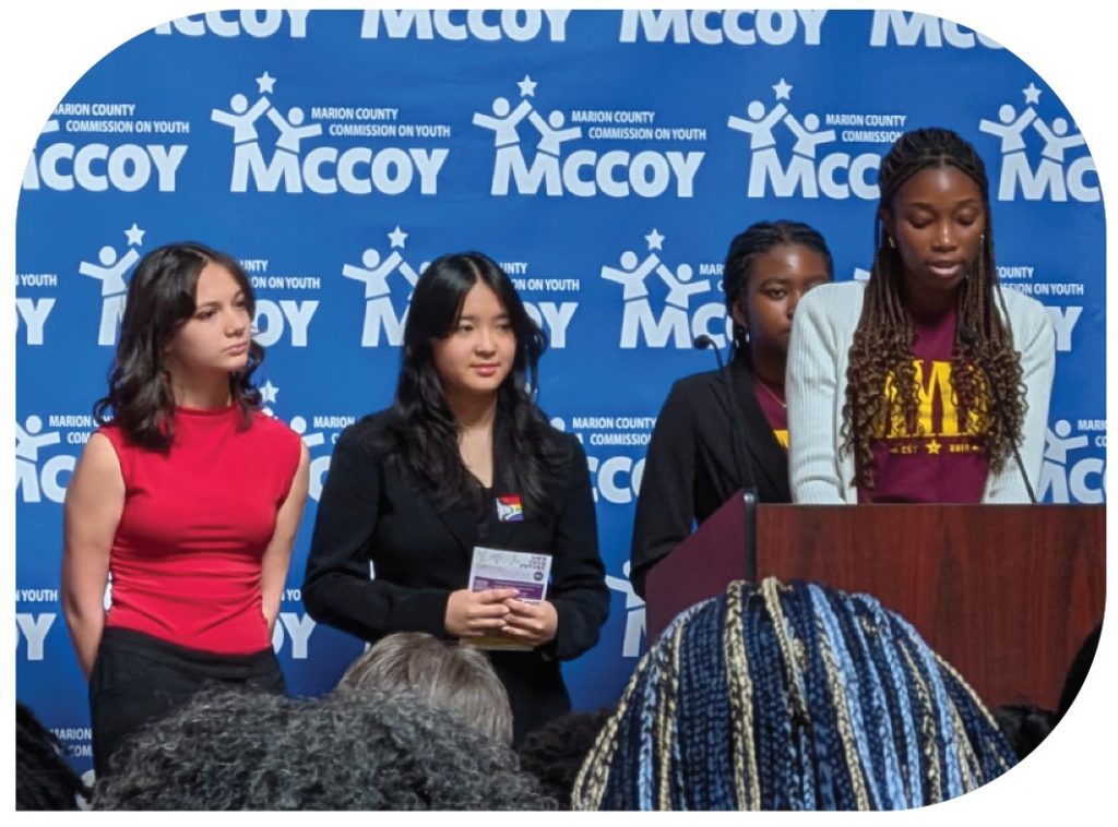 Young people address the crowd of volunteers at the Statehouse.