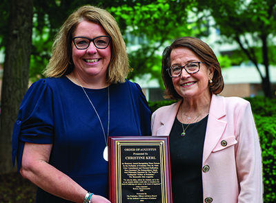 Christine Kerl (left) with Chief Justice Rush.